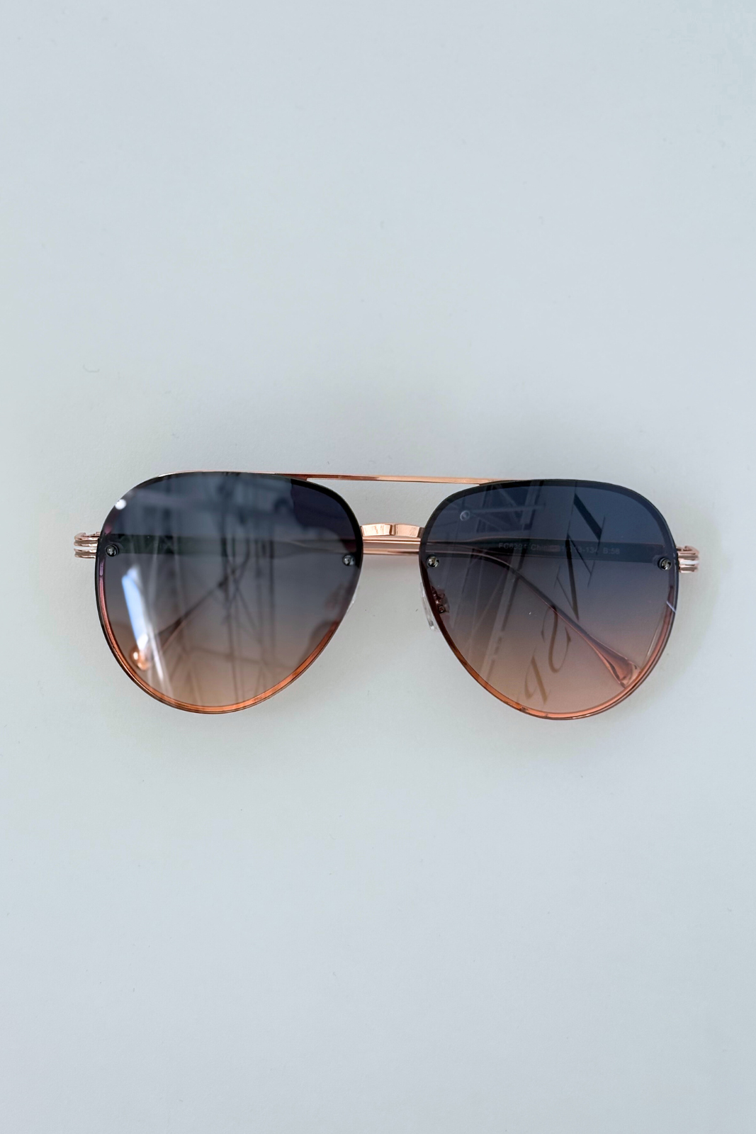 Lucy Rimless Aviator Sunglasses